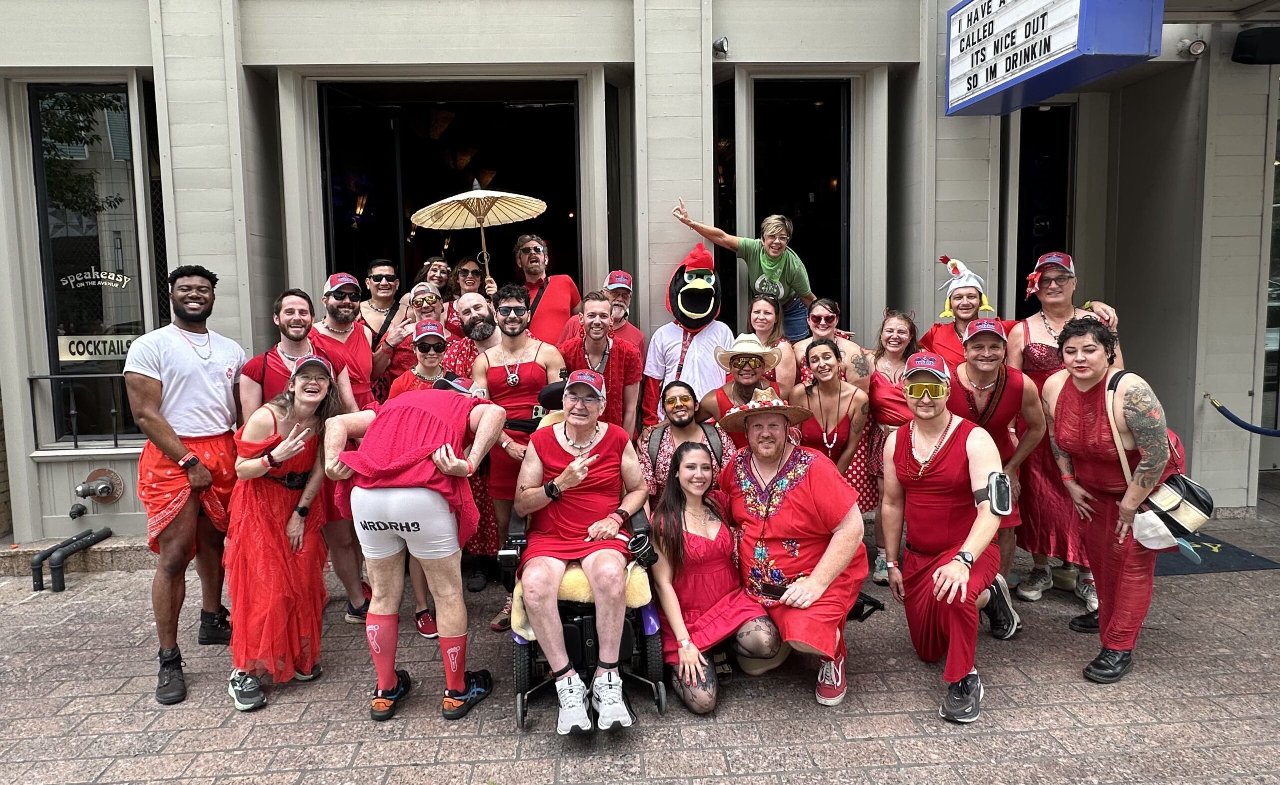 A group of hashers dressed in red dresses ready for Weirdest Red Dress R*n 2024